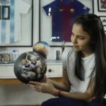 
              Paraguayan artist Lili Cantero holds a hand-painted soccer ball illustrated with members of the Germany squad for 2014 World Cup, in San Lorenzo, Paraguay, Thursday, Nov. 10, 2022. Decoratively detailing the lavish stadiums of the upcoming tournament in Qatar — the first to take place in the Middle East — as well as the most sought after players and teams, Cantero is preparing the last details of her soccer-inspired art show, “8 Stadiums, 8 Champions, 1 Dream: Qatar 2022.” (AP Photo/Jorge Saenz)
            