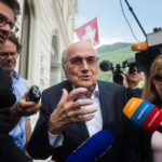 
              FILE -  Former FIFA president Sepp Blatter is surrounded by the media as he leaves the Swiss Federal Criminal Court in Bellinzona, Switzerland, Wednesday, June 8, 2022. Blatter said on Tuesday, Nov. 8, 2022, that picking Qatar to host the World Cup was a mistake 12 years ago. (Alessandro Crinari/Keystone via AP, File)
            