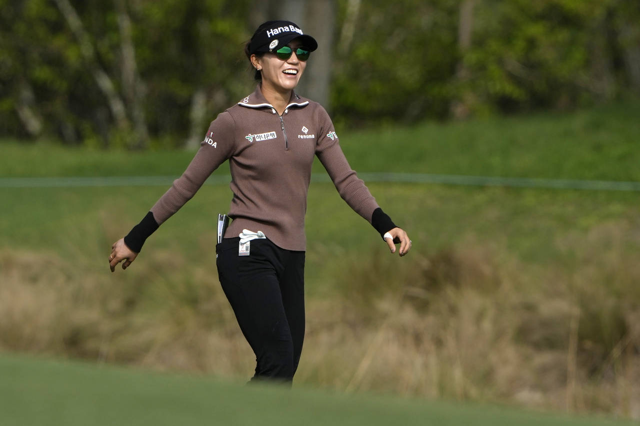 Lydia Ko, of New Zealand, walks on the ninth fairway during the second round of the LPGA CME Group ...