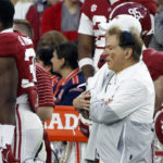 
              Alabama head coach Nick Saban sports a facial injury after being bumped during the first half of an NCAA college football game against Auburn, Saturday, Nov. 26, 2022, in Tuscaloosa, Ala. (AP Photo/Butch Dill)
            