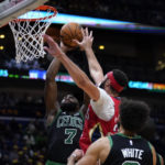 
              Boston Celtics guard Jaylen Brown (7) goes to the basket against New Orleans Pelicans forward Larry Nance Jr. in the second half of an NBA basketball game in New Orleans, Friday, Nov. 18, 2022. The Celtics won 117-109. (AP Photo/Gerald Herbert)
            