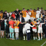 
              Canada's head coach John Herdman talks with his team after their loss in the World Cup group F soccer match between Belgium and Canada, at the Ahmad Bin Ali Stadium in Doha, Qatar, Wednesday, Nov. 23, 2022. (AP Photo/Ariel Schalit)
            