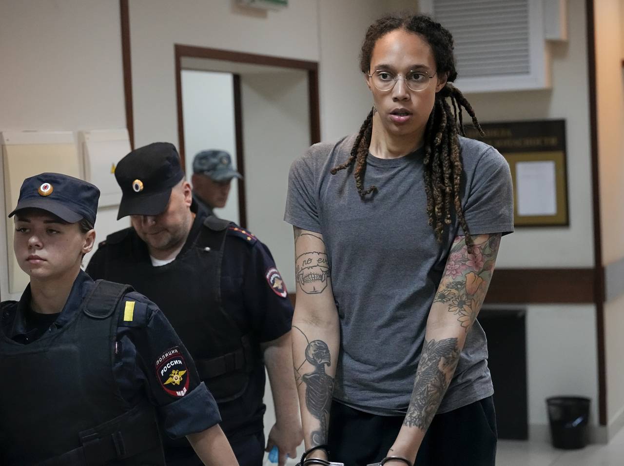 FILE - WNBA star and two-time Olympic gold medalist Brittney Griner is escorted from a courtroom af...