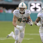 
              Miami Dolphins linebacker Andrew Van Ginkel (43) runs after intercepting a pass during the first half of an NFL football game against the Houston Texans, Sunday, Nov. 27, 2022, in Miami Gardens, Fla. (AP Photo/Michael Laughlin)
            