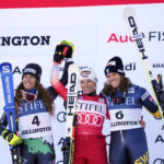 
              Switzerland's Lara Gut-Behrami, first place, center, and Italy's Marta Bassino, second place, left, and Sweden's Sara Hector, third place, acknowledge applause on the podium following a World Cup giant slalom skiing race Saturday, Nov. 26, 2022, in Killington, Vt. (AP Photo/Robert F. Bukaty)
            