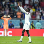 
              Timothy Weah of the United States celebrates after scoring his side's opening goal during the World Cup, group B soccer match between the United States and Wales, at the Ahmad Bin Ali Stadium in Doha, Qatar, Monday, Nov. 21, 2022. (AP Photo/Ashley Landis)
            