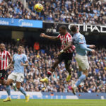 
              Brentford's Ivan Toney heads the ball to score his side's first goal during the English Premier League soccer match between Manchester City and Brentford, at the Etihad stadium in Manchester, England, Saturday, Nov.12, 2022. (AP Photo/Dave Thompson)
            