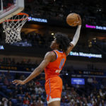 
              Oklahoma City Thunder forward Jalen Williams dunks against the New Orleans Pelicans in the second quarter of an NBA basketball game in New Orleans, Monday, Nov. 28, 2022. (AP Photo/Derick Hingle)
            