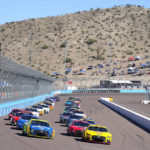 
              Joey Logano (22) leads the field on the parade lap during a NASCAR Cup Series auto race Sunday, Nov. 6, 2022, in Avondale, Ariz. (AP Photo/Rick Scuteri)
            