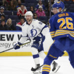 
              Tampa Bay Lightning center Steven Stamkos (91) scores the winning goal during overtime of an NHL hockey game against the Buffalo Sabres, Monday, Nov. 28, 2022, in Buffalo, N.Y. (AP Photo/Joshua Bessex)
            
