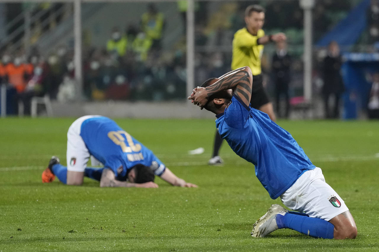 FILE - Italy's Joao Pedro reacts after missing a scoring chance in the World Cup qualifying play-of...