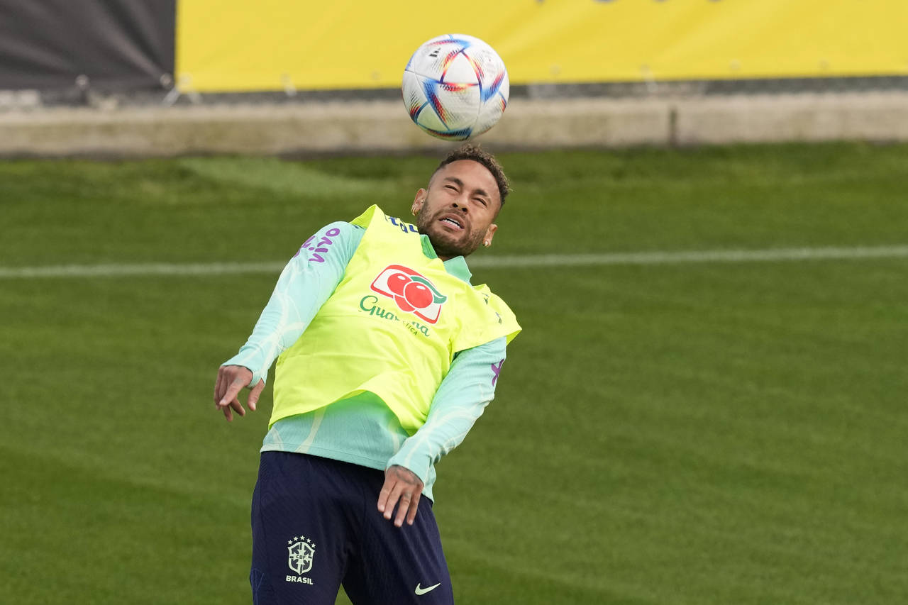 Brazil's Neymar controls the ball during a training session at the Continassa sporting center, in T...