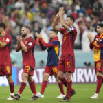 
              Spain's Marco Asensio, Dani Carvajal, Jordi Alba, Sergio Busquets and Carlos Soler, from left, applaud the fans at the end of the World Cup group E soccer match between Spain and Germany, at the Al Bayt Stadium in Al Khor , Qatar, Sunday, Nov. 27, 2022. The match ended in a 1-1 draw. (AP Photo/Matthias Schrader)
            