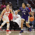 
              North Alabama's Jade Moore, right, looks for an open pass as Ohio State's Madison Greene defends during the first half of an NCAA college basketball game on Sunday, Nov. 27, 2022, in Columbus, Ohio. (AP Photo/Jay LaPrete)
            