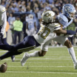 
              Georgia Tech defensive back LaMiles Brooks (20) breaks up a pass intended for North Carolina wide receiver Kobe Paysour (8) during the first half of an NCAA college football game, Saturday, Nov. 19, 2022, in Chapel Hill, N.C. (AP Photo/Chris Seward)
            