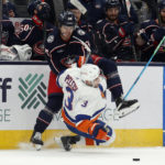 
              New York Islanders defenseman Adam Pelech, right, collides with Columbus Blue Jackets forward Cole Sillinger during the second period of an NHL hockey game in Columbus, Ohio, Friday, Nov. 25, 2022. (AP Photo/Paul Vernon)
            