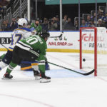 
              Dallas Stars' Ty Dellandrea (10) scores a goal against the St. Louis Blues during the third period of an NHL hockey game Monday, Nov. 28, 2022, in St. Louis. (AP Photo/Michael Thomas)
            