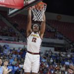 
              Iowa State forward Robert Jones dunks against North Carolina during the second half of an NCAA college basketball game in the Phil Knight Invitational tournament in Portland, Ore., Friday, Nov. 25, 2022. (AP Photo/Craig Mitchelldyer)
            