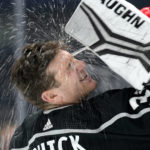 
              Los Angeles Kings goaltender Jonathan Quick sprays himself with water prior to the first period of an NHL hockey game against the Florida Panthers Saturday, Nov. 5, 2022, in Los Angeles. (AP Photo/Mark J. Terrill)
            