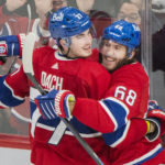 
              Montreal Canadiens' Mike Hoffman (68) celebrates with teammate Kirby Dach after scoring against the Pittsburgh Penguins during overtime period of an NHL hockey action in Montreal, Saturday, Nov. 12, 2022. (Graham Hughes/The Canadian Press via AP)
            
