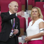 
              German Football Federation (DFB) President Bernd Neuendorf, left, talks to German Interior Minister Nancy Faeser, right, wearing the One Love armband on the tribune prior to the World Cup group E soccer match between Germany and Japan, at the Khalifa International Stadium in Doha, Qatar, Wednesday, Nov. 23, 2022. (AP Photo/Matthias Schrader)
            