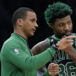 
              Boston Celtics interim head coach Joe Mazzulla, left, speaks with guard Marcus Smart, right, in the first half of an NBA basketball game against the Washington Wizards, Sunday, Oct. 30, 2022, in Boston. (AP Photo/Steven Senne)
            