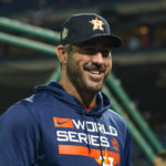 
              Houston Astros starting pitcher Justin Verlander smiles before Game 3 of baseball's World Series between the Houston Astros and the Philadelphia Phillies on Tuesday, Nov. 1, 2022, in Philadelphia. (AP Photo/Chris Szagola)
            