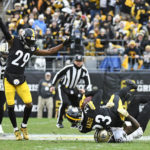 
              Pittsburgh Steelers Damontae Kazee intercepts a pass intended for New Orleans Saints wide receiver Jarvis Landry (5) during the second half of an NFL football game in Pittsburgh, Sunday, Nov. 13, 2022. The Steelers won 20-10. (AP Photo/Don Wright)
            
