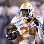 
              Tennessee running back Dylan Sampson (24) heads for a touchdown during the second half of the team's NCAA college football game against Vanderbilt, Saturday, Nov. 26, 2022, in Nashville, Tenn. (AP Photo/Wade Payne)
            