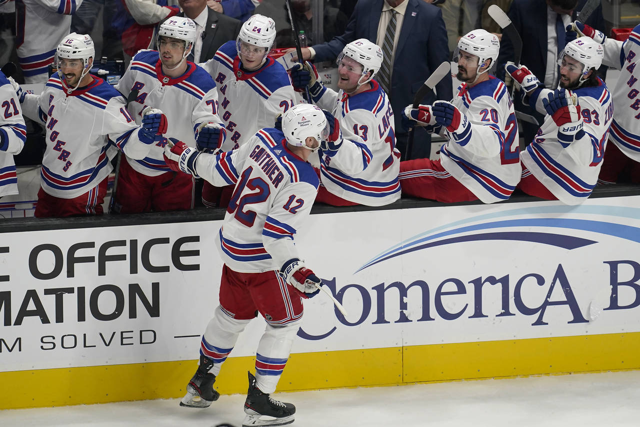New York Rangers right wing Julien Gauthier (12) is congratulated after scoring against the San Jos...
