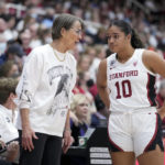 
              Stanford head coach Tara VanDerveer, left, talks with guard Talana Lepolo (10) during the first half of an NCAA college basketball game against South Carolina in Stanford, Calif., Sunday, Nov. 20, 2022. (AP Photo/Godofredo A. Vásquez)
            