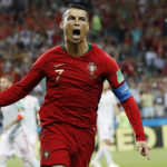 
              ARCHIVO - Cristiano Ronaldo celebra tras anotar un gol para Portugal en el partido contra España en la fase de grupos del Mundial en Sochi, Rusia, el viernes 15 de junio de 2018. (AP Foto/Francisco Seco)
            