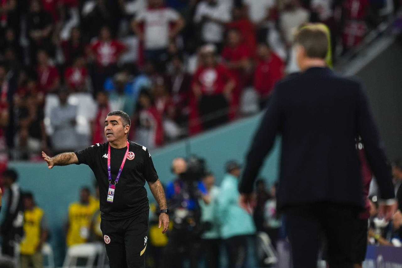 Tunisia's head coach Jalel Kadri gives instructions from the side line during the World Cup group D...