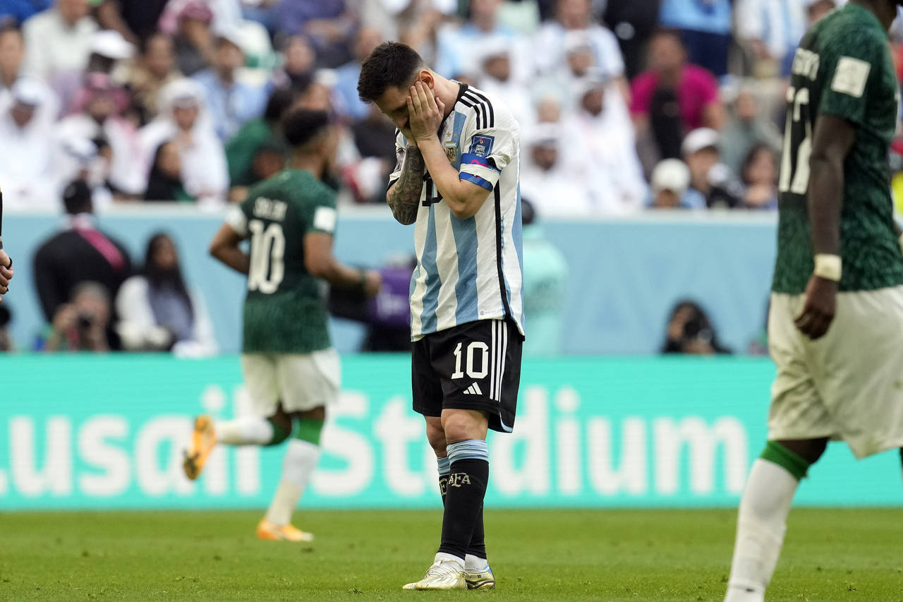 Argentina's Lionel Messi reacts disappointed during the World Cup group C soccer match between Arge...
