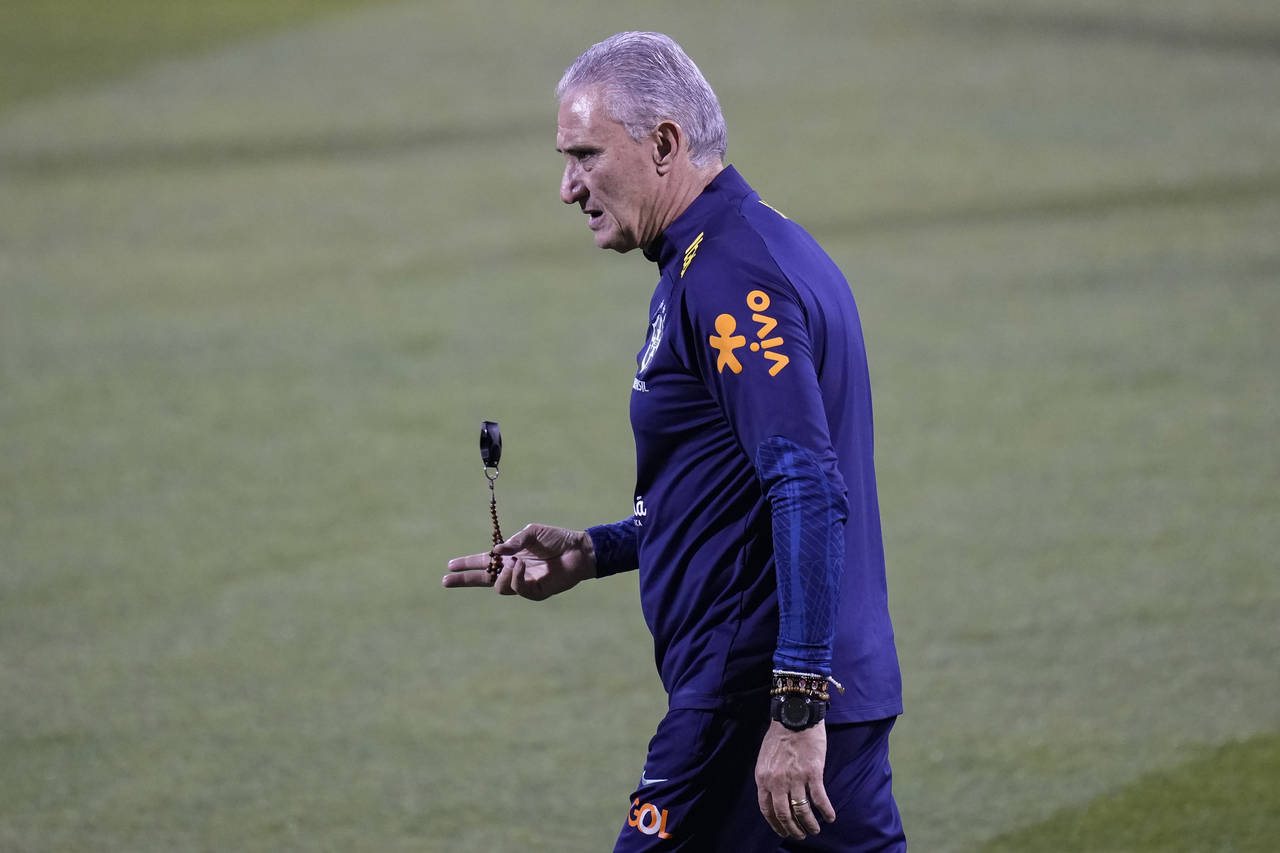 Brazil's head coach Tite attends a training session at the Grand Hamad stadium in Doha, Qatar, Tues...