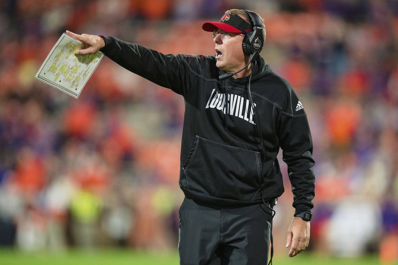 Louisville head coach Scott Satterfield looks on in the second half of an NCAA college football gam...