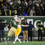 
              Colorado State defensive back Henry Blackburn (11) hits Wyoming wide receiver Will Pelissier (83) during the second quarter of an NCAA college football game Saturday, Nov. 12, 2022, in Fort Collins, Colo. Pelissier was injured on the play. (Andy Cross/The Denver Post via AP)
            