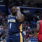 
              New Orleans Pelicans forward Zion Williamson (1) flexes his bicep after scoring a basket in the first half of an NBA basketball game against the Toronto Raptors in New Orleans, Wednesday, Nov. 30, 2022. (AP Photo/Gerald Herbert)
            