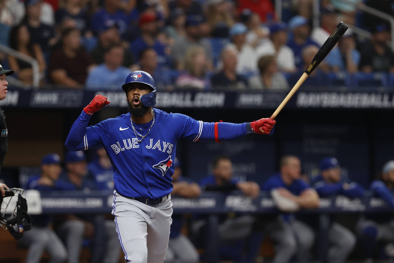 Toronto Blue Jays' Teoscar Hernandez reacts while batting during a baseball game Sept. 24, 2022, in...