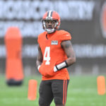 
              Cleveland Browns quarterback Deshaun Watson stands on the field during an NFL football practice at the team's training facility Wednesday, Nov. 16, 2022, in Berea, Ohio. (AP Photo/David Richard)
            