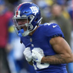 
              New York Giants wide receiver Isaiah Hodgins reacts after catching a pass against the Houston Texans during the fourth quarter of an NFL football game, Sunday, Nov. 13, 2022, in East Rutherford, N.J. (AP Photo/Seth Wenig)
            