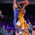 
              In a photo provided by Bahamas Visual Services, Southern California's Reese Dixon-Waters shoots against BYU forward Noah Waterman during an NCAA college basketball game in the Battle 4 Atlantis at Paradise Island, Bahamas, Wednesday, Nov. 23, 2022. (Tim Aylen/Bahamas Visual Services via AP)
            