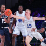 
              In a photo provided by Bahamas Visual Services, Butler's Manny Bates, left, passes the ball as BYU's Richie Saunders reaches for it during an NCAA college basketball game in the Battle 4 Atlantis at Paradise Island, Bahamas, Thursday, Nov. 24, 2022. (Tim Aylen/Bahamas Visual Services via AP)
            