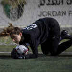 
              Joud Shunti, 23-year-old goalkeeper, works out during a training of the Orthodox Club's women's team in Amman, Jordan, Saturday, Oct. 22, 2022. Women's soccer has been long been neglected in the Middle East, a region that is mad for the men's game and hosts the World Cup for the first time this month in Qatar. (AP Photo/Raad AL-Adayleh)
            