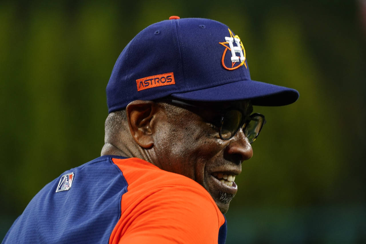 Houston Astros manager Dusty Baker Jr. watches batting practice before Game 3 of baseball's World S...