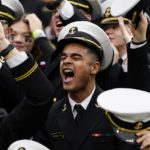 
              Navy midshipmen cheer during the first half of an NCAA college football game against Cincinnati, Saturday, Nov. 5, 2022, in Cincinnati. (AP Photo/Jeff Dean)
            