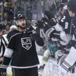 
              Los Angeles Kings center Phillip Danault (24) is congratulated by teammates after scoring against the San Jose Sharks during the first period of an NHL hockey game Friday, Nov. 25, 2022, in San Jose, Calif. (AP Photo/Tony Avelar)
            