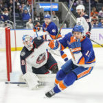 
              New York Islanders left wing Zach Parise (11) reacts after scoring a goal during the extra period of an NHL hockey game against the Columbus Blue Jackets, Saturday, Nov. 12, 2022, in Elmont, N.Y. New York Islanders won 4-3. (AP Photo/Eduardo Munoz Alvarez)
            