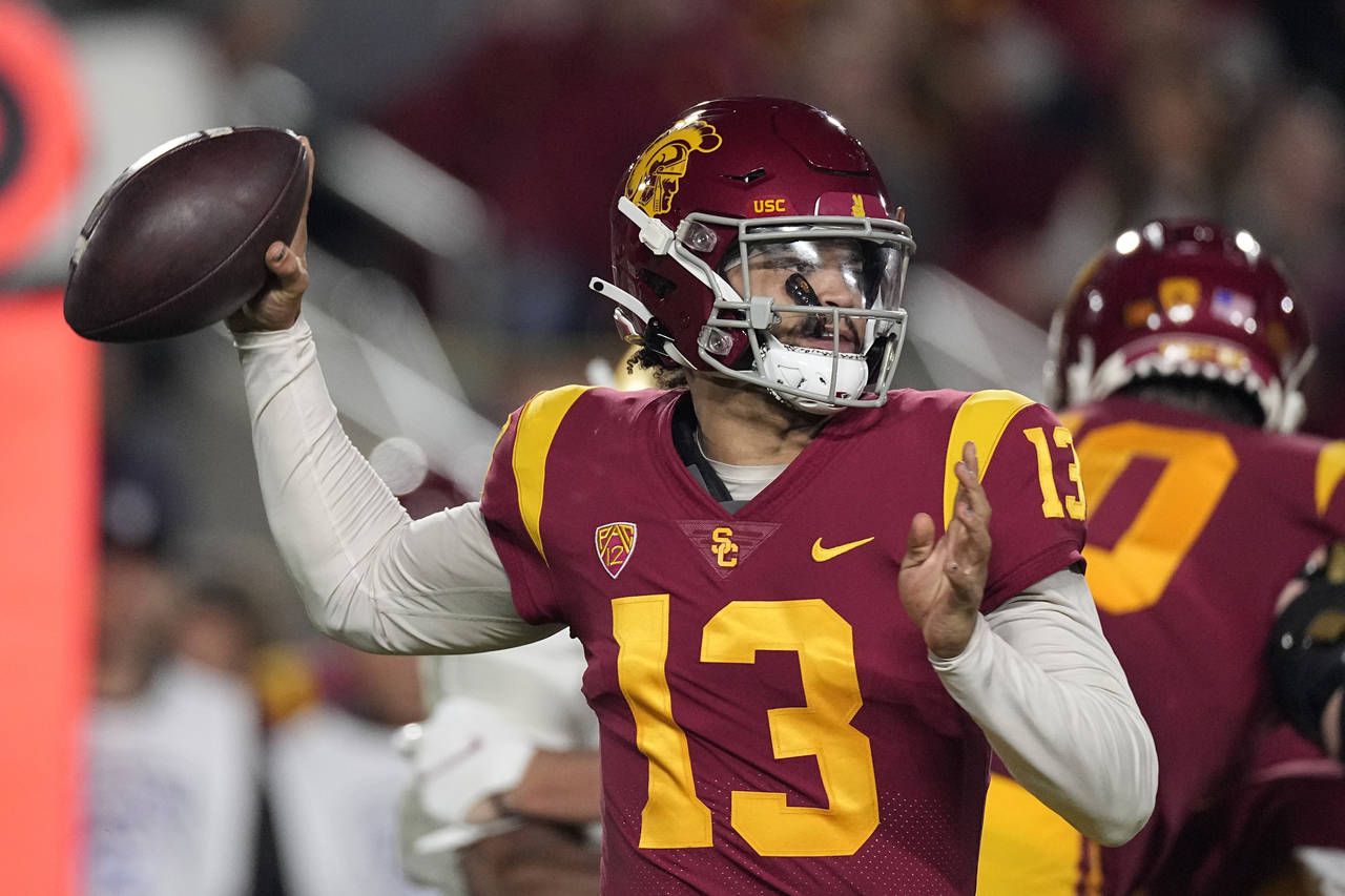 Southern California quarterback Caleb Williams passes during the first half of an NCAA college foot...
