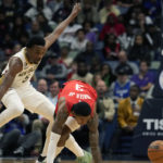 
              Houston Rockets guard Kevin Porter Jr. (3) loses the ball under pressure from New Orleans Pelicans forward Herbert Jones (5) in the first half of an NBA basketball game in New Orleans, Saturday, Nov. 12, 2022. (AP Photo/Gerald Herbert)
            